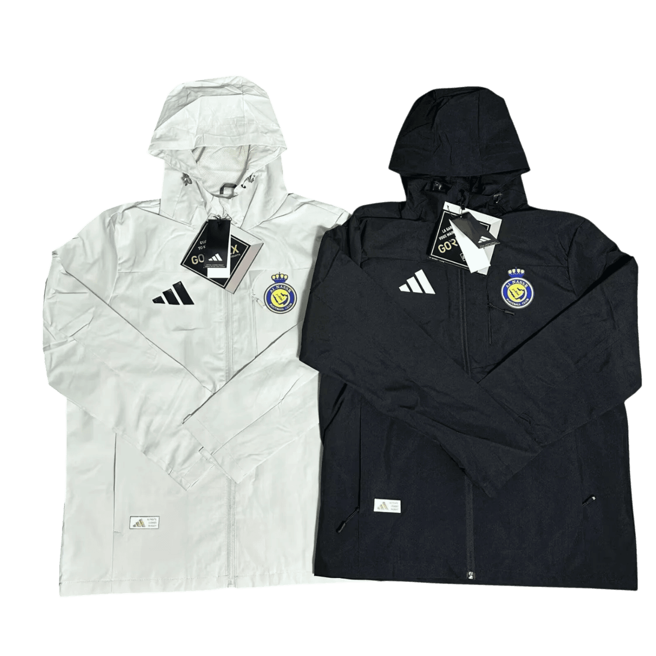 worldjersey-sa-s-al-nassr-fc-interchange-jacket-black-white-windbreaker-25-26-54734661746997.png Al-Nassr FC Interchange Jacket Black White Windbreaker 25/26 - Image 1
